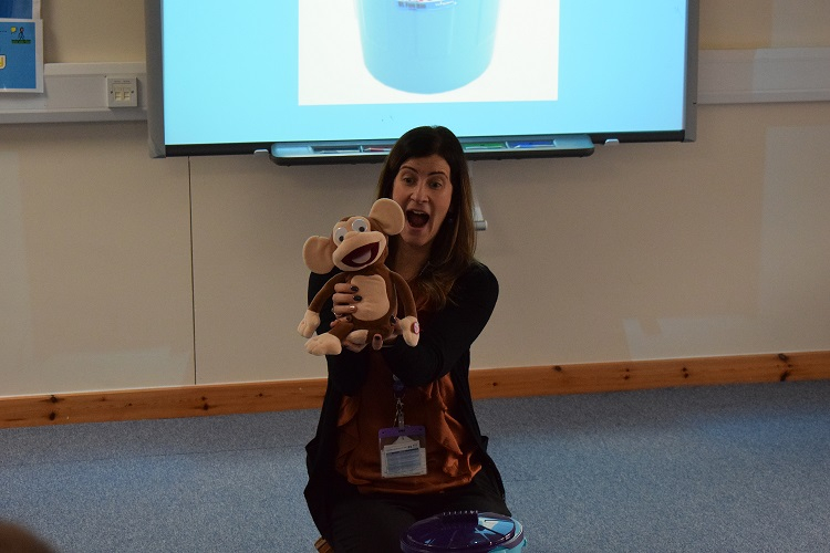 Deborah holding monkey toy