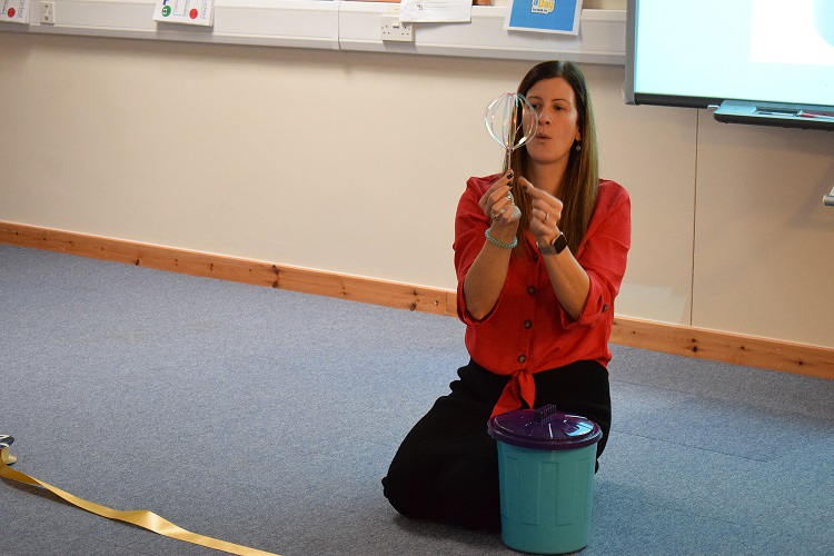 Deborah holding the spinner