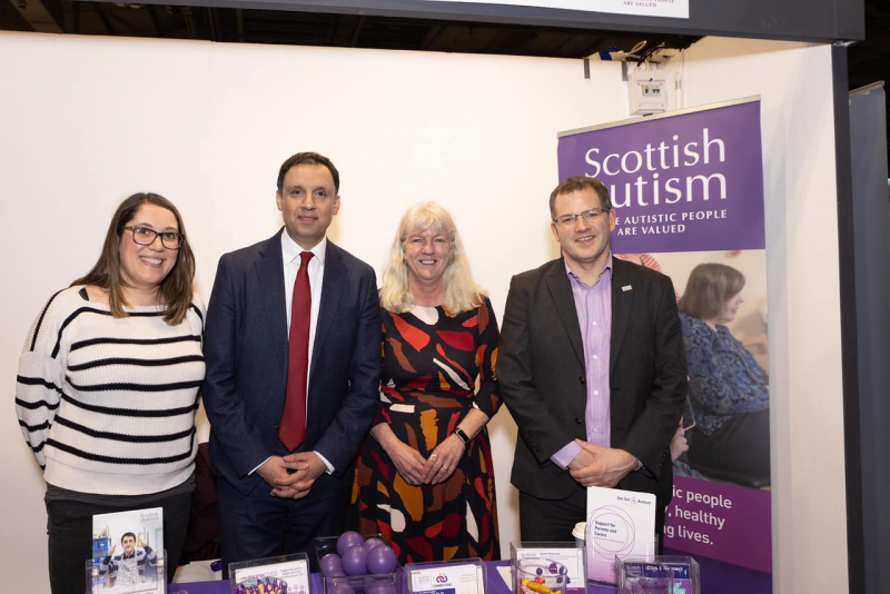 Image is of Scottish Autism team members and Anas Sarwar at a conference